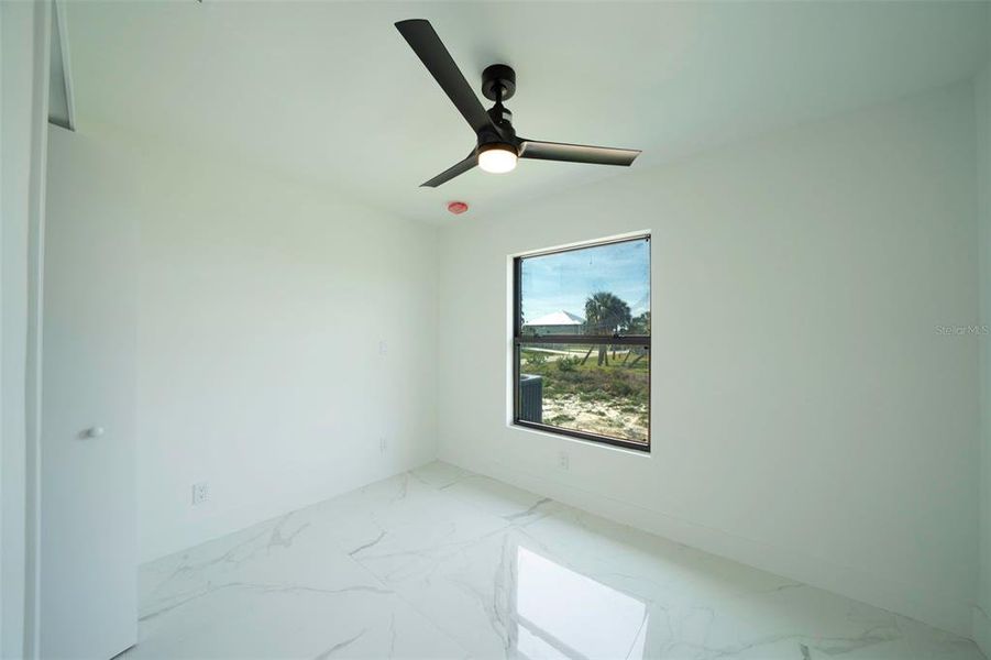 Spacious, unfurnished interior of a new home in , Punta Gorda (Image 41).