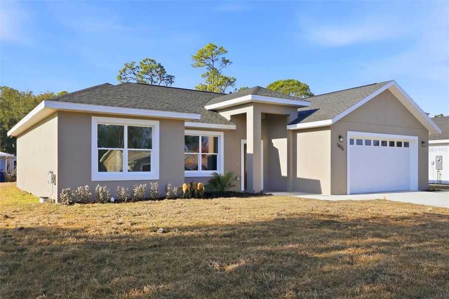 Front exterior of a new home in , Sebring, FL, highlighting curb appeal (Image 20).