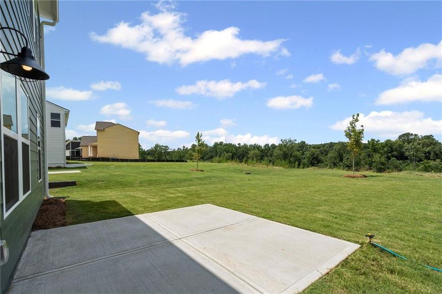 Front exterior of a new home in Crossvine Estates, Braselton, GA, highlighting curb appeal (Image 22).