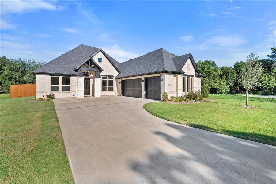 Front exterior of a new home in , Arlington, TX, highlighting curb appeal (Image 20).