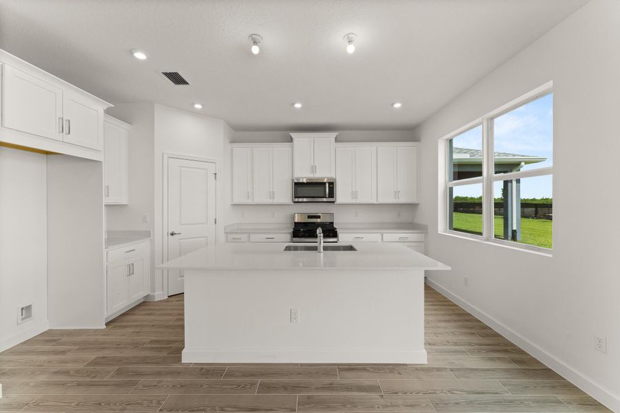Furnished interior view inside a new home in Tradition - Cadence, Port St. Lucie (Image 6).