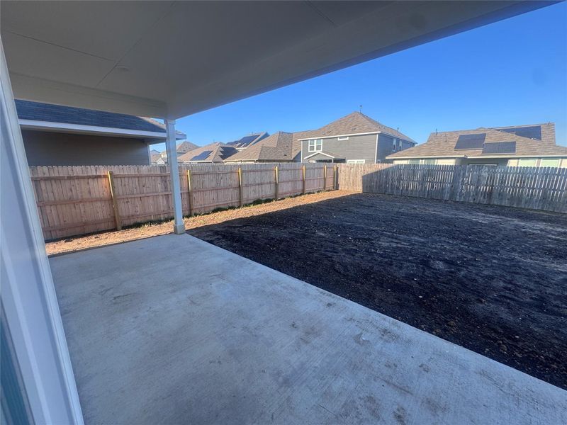 Exterior details and patio area of a home in Rolling Glen, Hutto (Image 18).