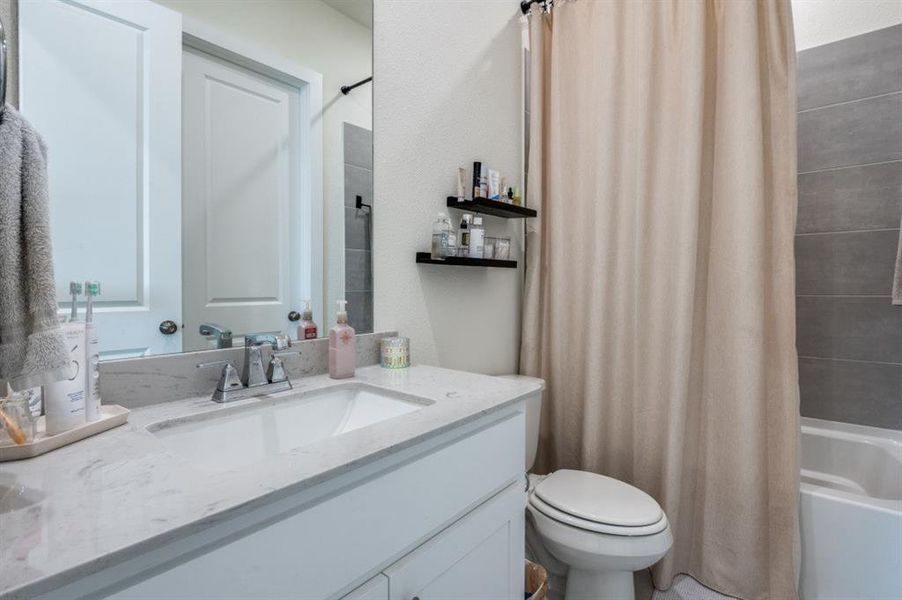 Bathroom with vanity and shower / tub combo Bathroom with vanity and shower / tub combo