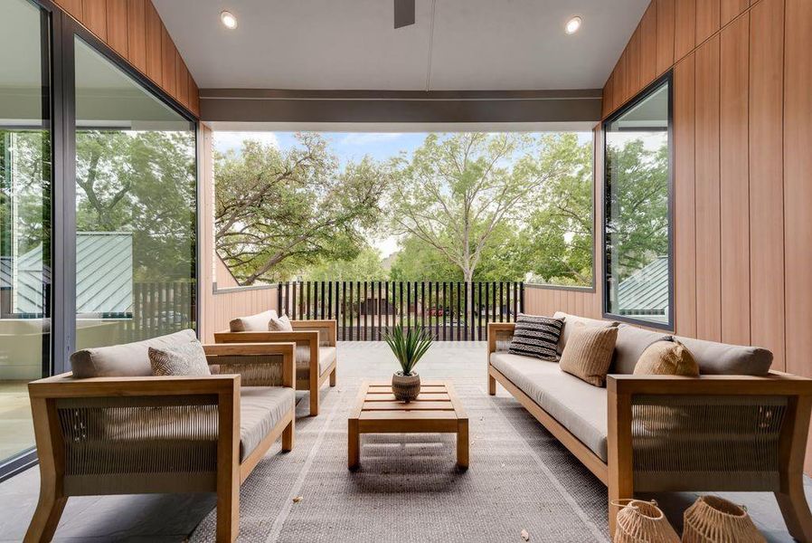 A private balcony extends the living space and offers an elevated outdoor retreat; affectionately coined "The Treehouse".