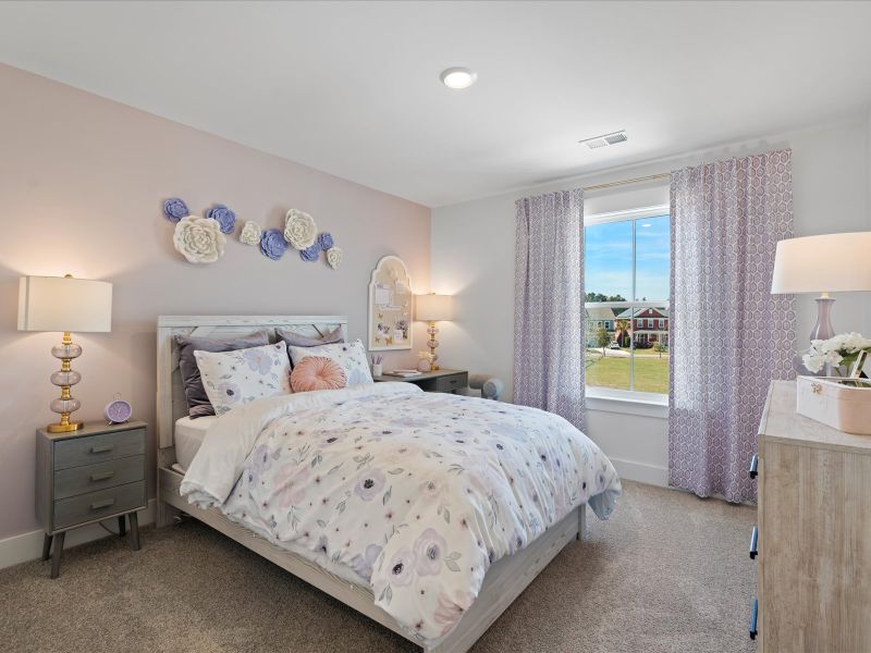 Furnished interior view inside a new home in The Coves at Lakes of Cane Bay, Summerville (Image 23).