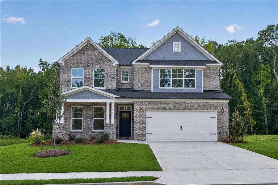 Front exterior of a new home in , Loganville, GA, highlighting curb appeal (Image 29). Front exterior of a new home in , Loganville, GA, highlighting curb appeal (Image 29).