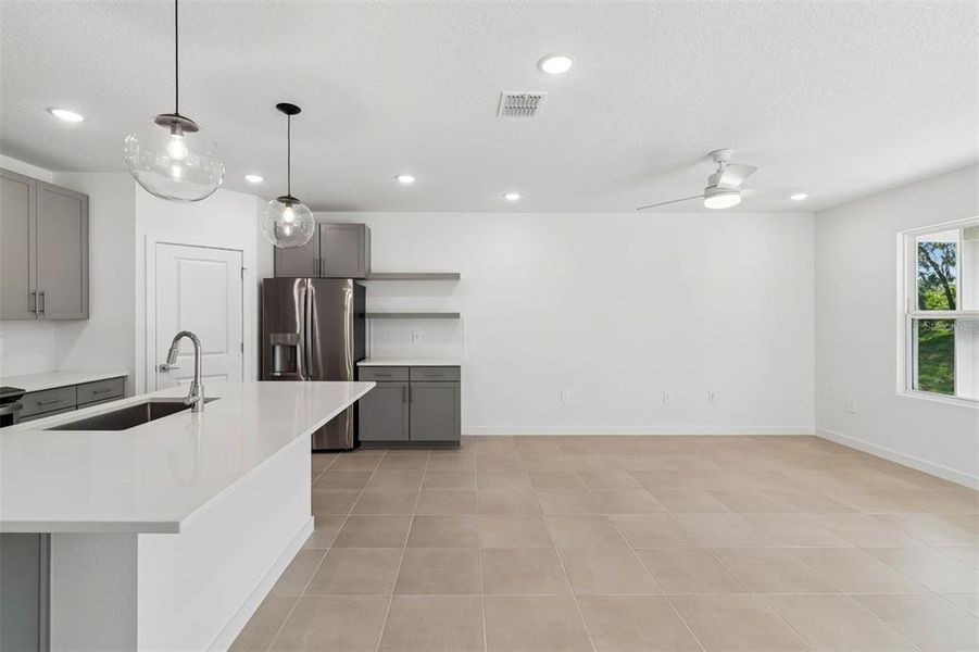 Furnished interior view inside a new home in Aspire at Canter Creek, Davenport (Image 4).