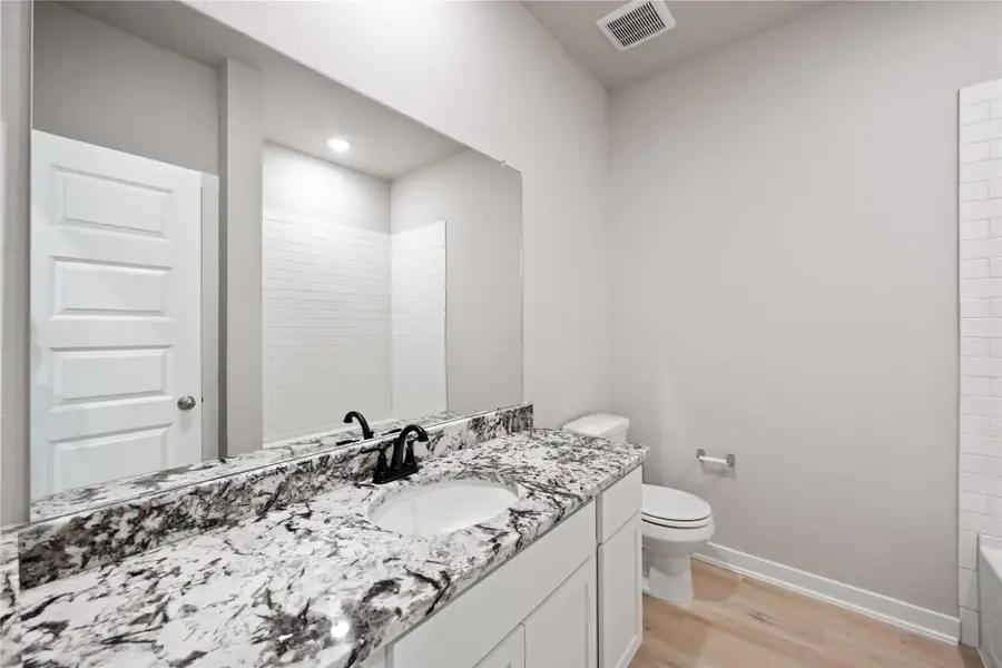 Furnished interior view inside a new home in Blue Heron Estates, Beasley (Image 11).