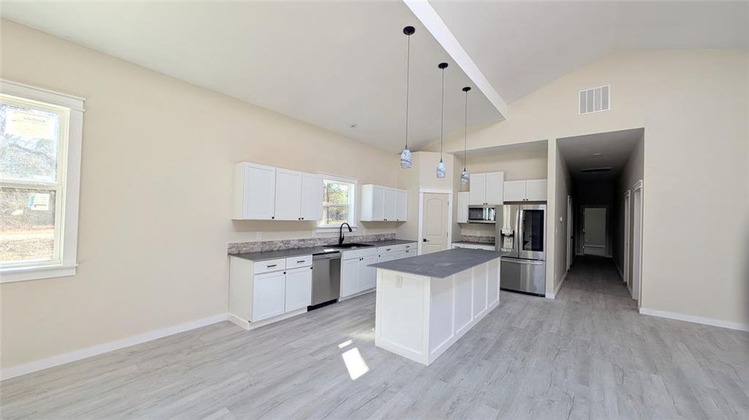 Open concept kitchen with porcelain countertops Open concept kitchen with porcelain countertops