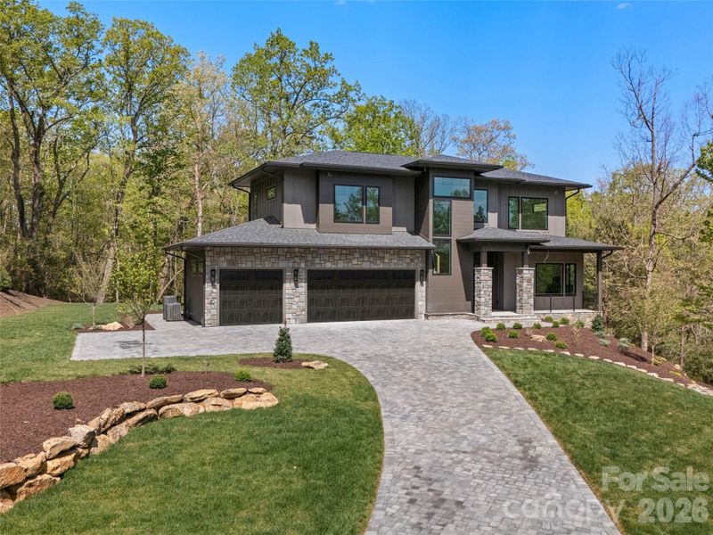 Front exterior of a new home in , Horse Shoe, NC, highlighting curb appeal (Image 13).
