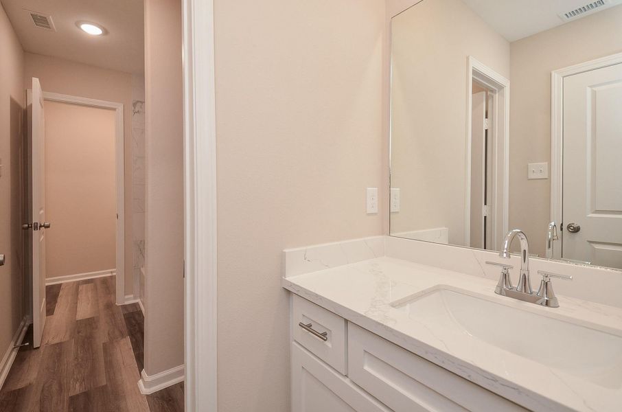 Clean, modern Jack-and-Jill hall baths—perfect for guests or a simple morning routine. Clean, modern Jack-and-Jill hall baths—perfect for guests or a simple morning routine.