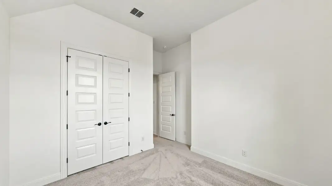 Furnished interior view inside a new home in Oaks at San Gabriel, Georgetown (Image 8).