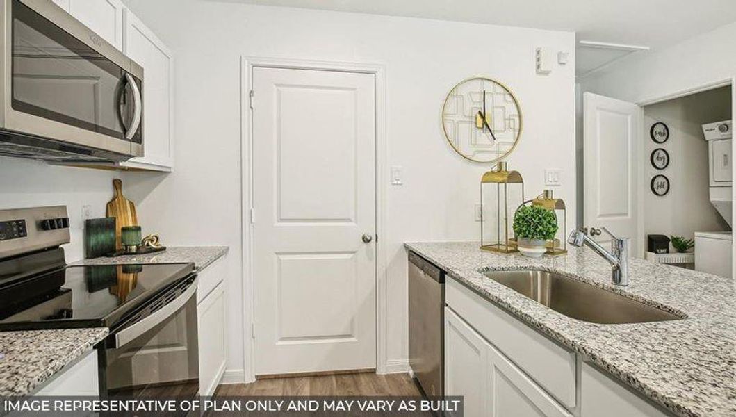 Furnished interior view inside a new home in William Trails, Willis (Image 5).