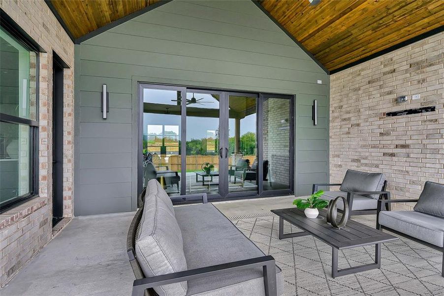 Back patio with sliding glass door, pre-wired for mounted TV & secuirty cameras