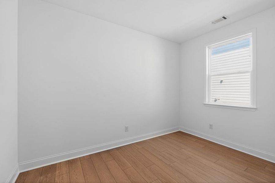 Spacious, unfurnished interior of a new home in Bailey Fence, Dacula (Image 25).