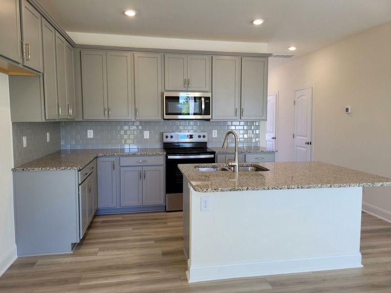 Furnished interior view inside a new home in 1158 Place Townhomes, Wilson (Image 5).