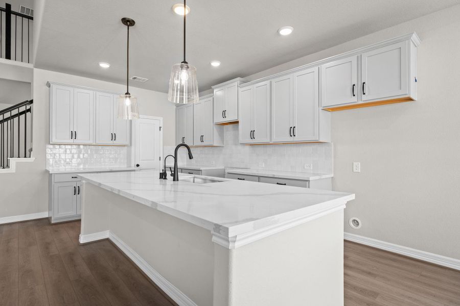 This kitchen is not only a functional space but also has ample storage. Whether you're a seasoned chef or just love to gather and enjoy good food, this kitchen is a dream come true.