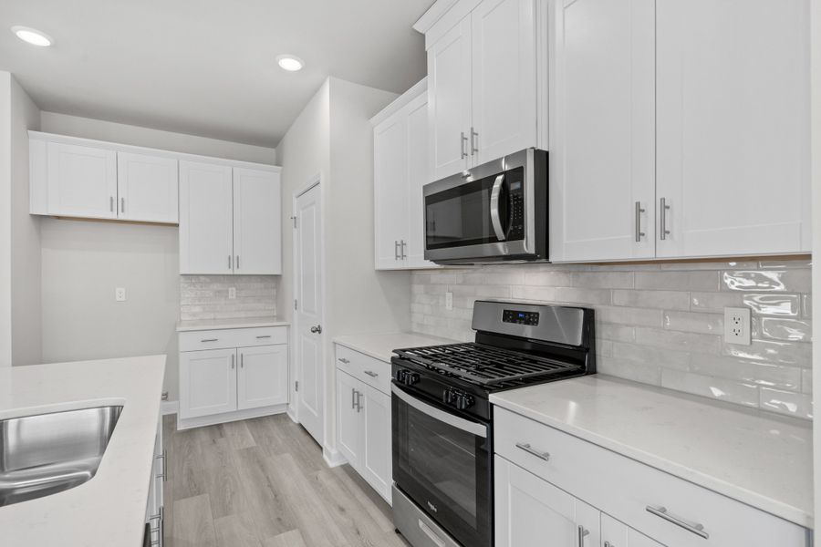 Furnished interior view inside a new home in Waterside - Coastline Series, Longs (Image 11).