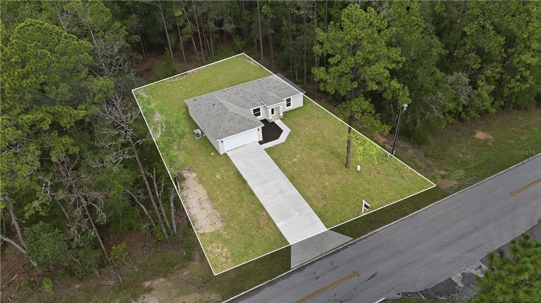 Front exterior of a new home in , Citrus Springs, FL, highlighting curb appeal (Image 25).