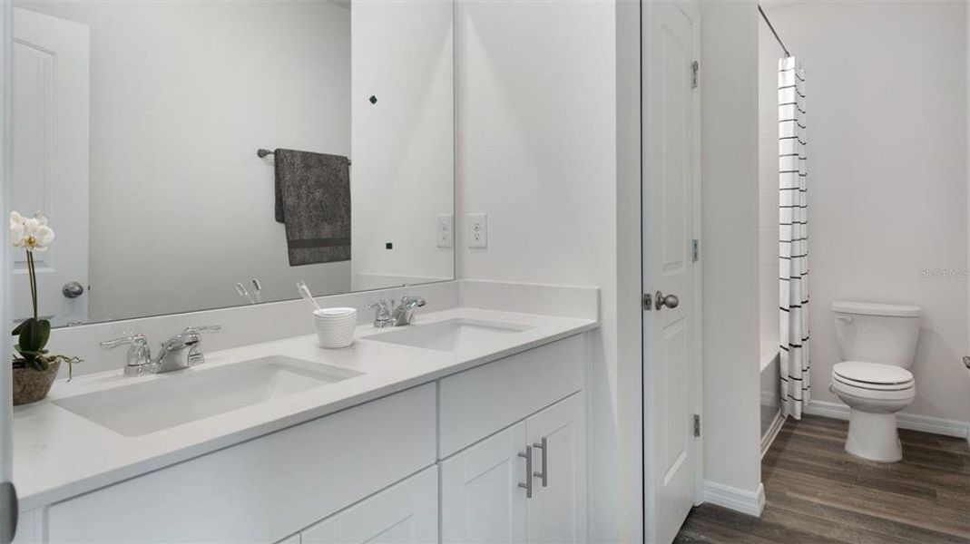 Furnished interior view inside a new home in Waterleigh, Winter Garden (Image 9).