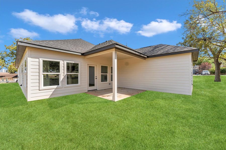 Front exterior of a new home in , Montgomery, TX, highlighting curb appeal (Image 1).