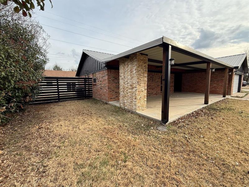 Exterior details and patio area of a home in , Joshua (Image 27).