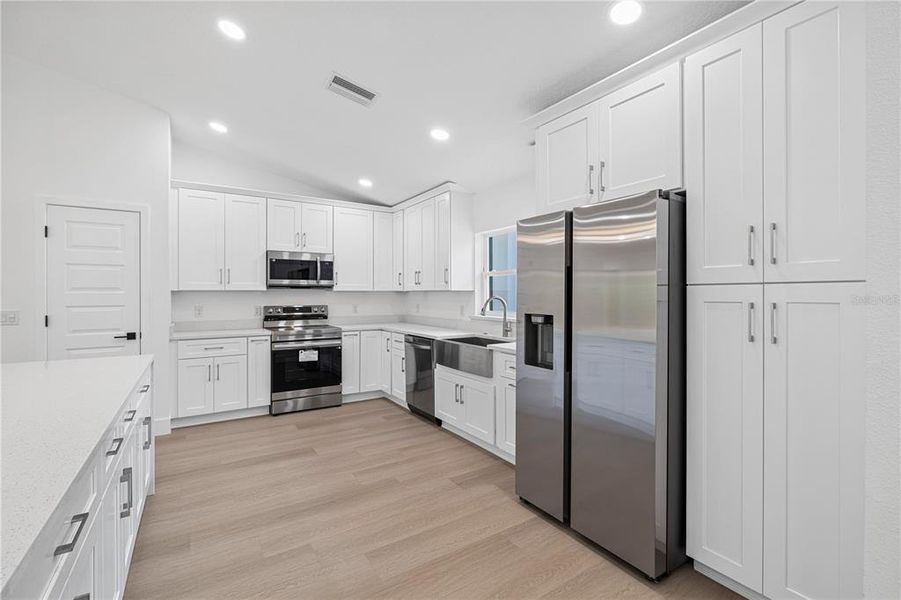 Furnished interior view inside a new home in , Dunnellon (Image 8).