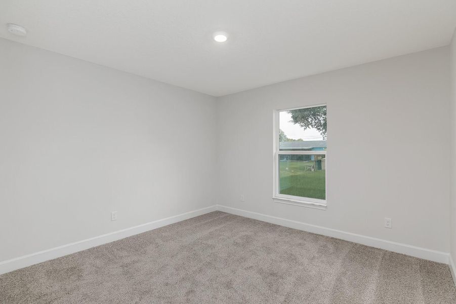 Spacious, unfurnished interior of a new home in Gatlin, Port St. Lucie (Image 24).