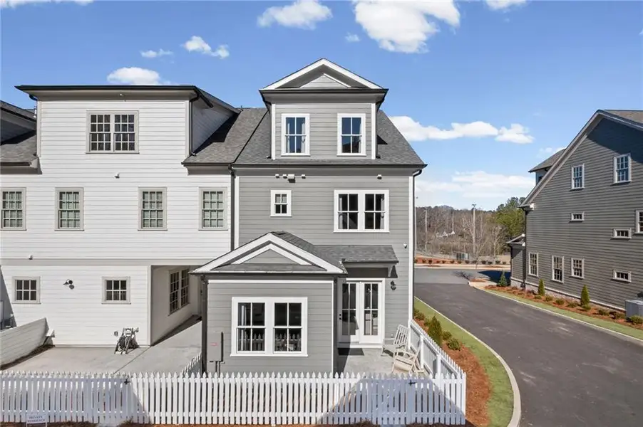 Front exterior of a new home in , Ball Ground, GA, highlighting curb appeal (Image 23).