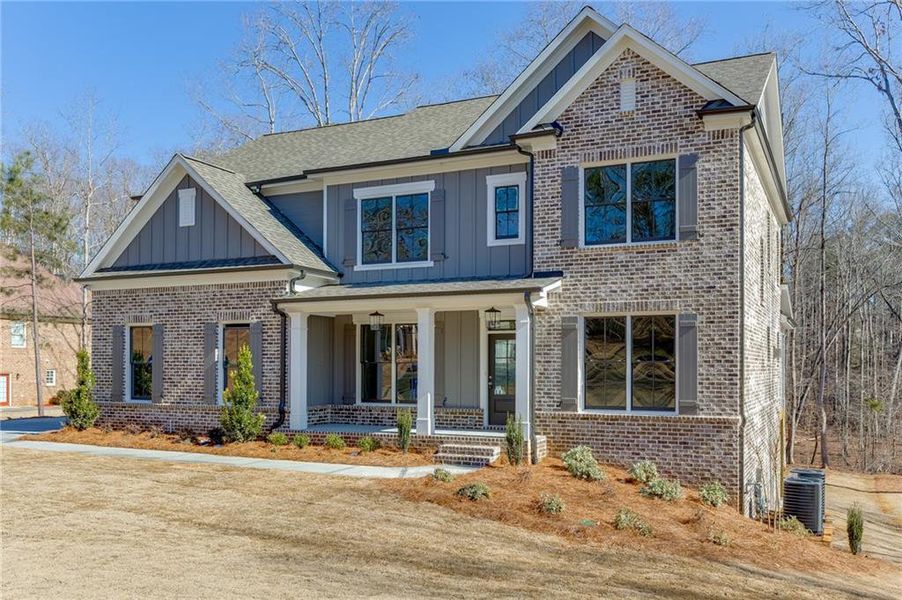 Front exterior of a new home in , Bishop, GA, highlighting curb appeal (Image 27).