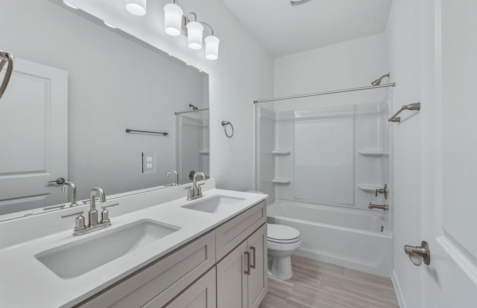 Furnished interior view inside a new home in Crosswinds, Kyle (Image 7).