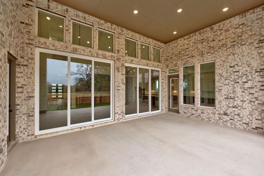 Exterior details and patio area of a home in Parkside On The River, Georgetown (Image 16).