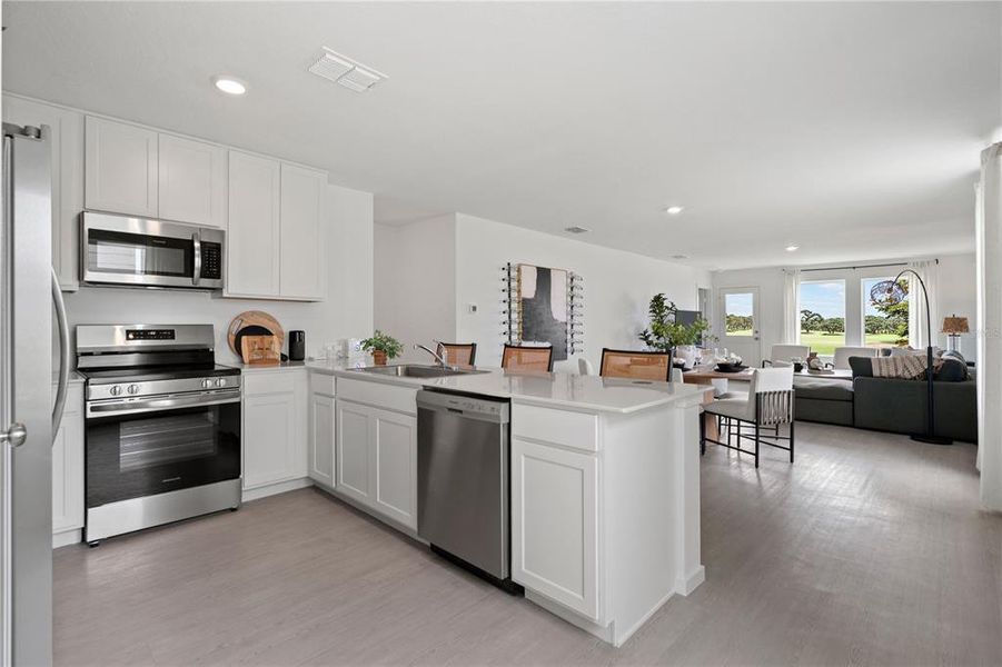 Furnished interior view inside a new home in Waterstone, Groveland (Image 11).