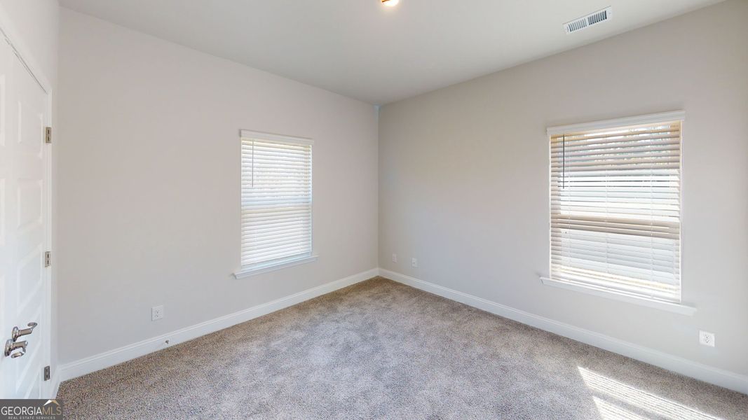 Spacious, unfurnished interior of a new home in Holliday Pass, Griffin (Image 18).