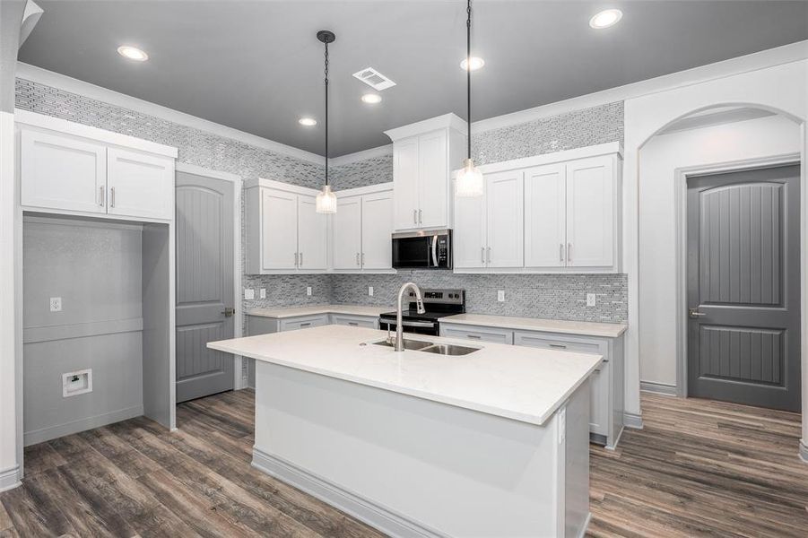 Furnished interior view inside a new home in , Enchanted Oaks (Image 9).