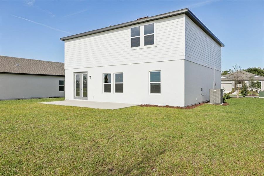 Exterior details and patio area of a home in Tyson Reserve, St. Cloud (Image 3).