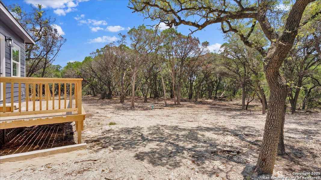 Front exterior of a new home in , Bandera, TX, highlighting curb appeal (Image 22). Front exterior of a new home in , Bandera, TX, highlighting curb appeal (Image 22).