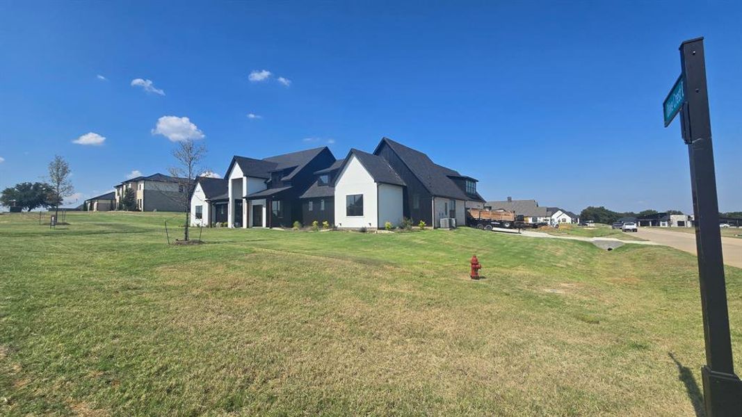 View of grassy yard featuring a residential view