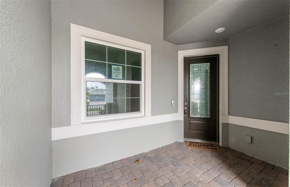 Exterior details and patio area of a home in Shores at Stillwater, Englewood (Image 19).