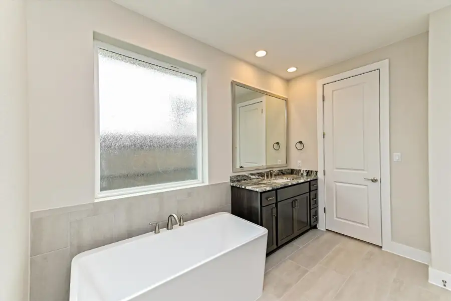 Representative furnished interior of a home built from the Opal by Giddens Homes in Riverstone, Georgetown (Image 11).