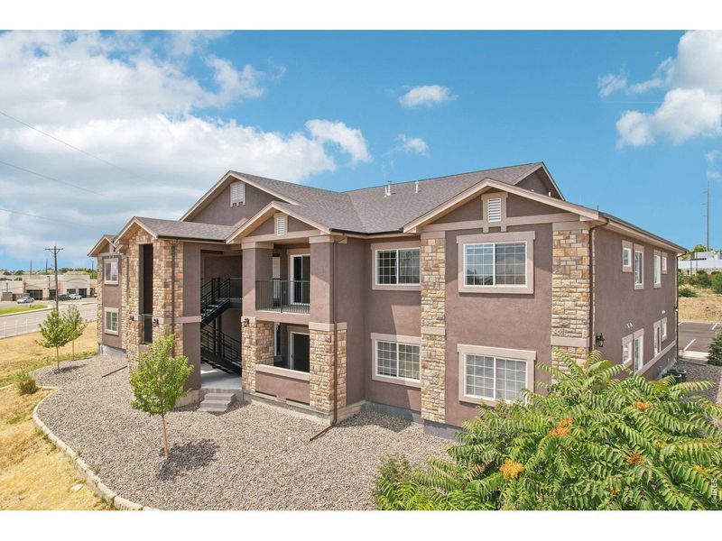 Front exterior of a new home in , Denver, CO, highlighting curb appeal (Image 19).