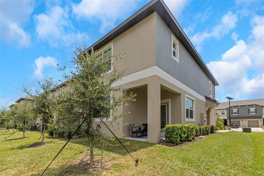Front exterior of a new home in , Land O' Lakes, FL, highlighting curb appeal (Image 27).