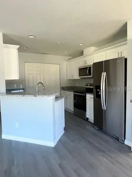 Furnished interior view inside a new home in , Mulberry (Image 3).