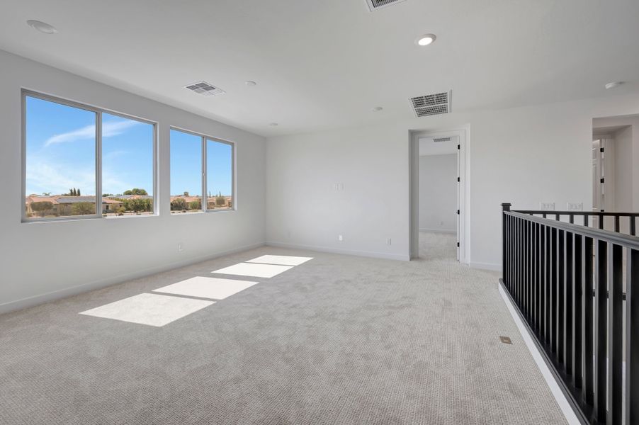 Spacious, unfurnished interior of a new home in Soleo, San Tan Valley (Image 34).