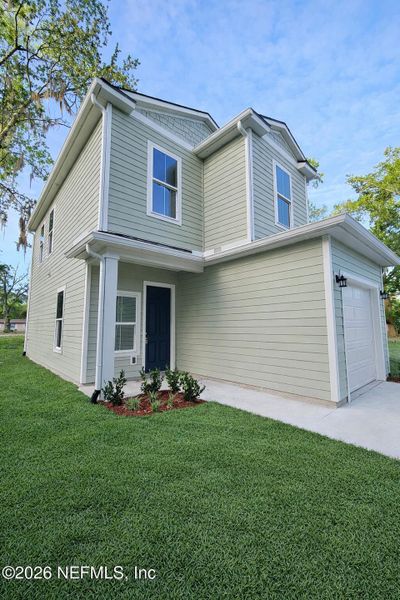 Front exterior of a new home in , Jacksonville, FL, highlighting curb appeal (Image 19).
