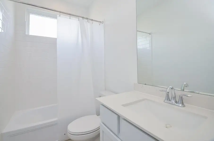 full bath serving the additional bedroom upstairs