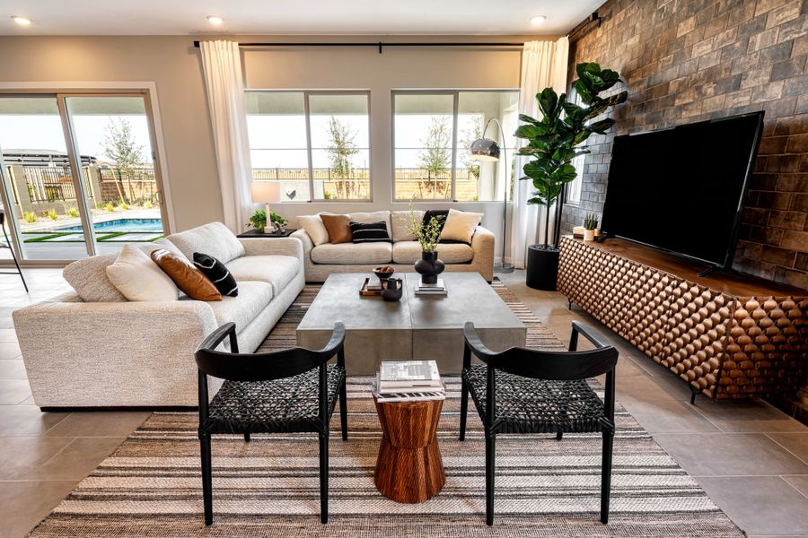 Representative furnished interior of a home built from the Willow Plan 40-9 by Tri Pointe Homes in Waterston Central, Gilbert (Image 5).