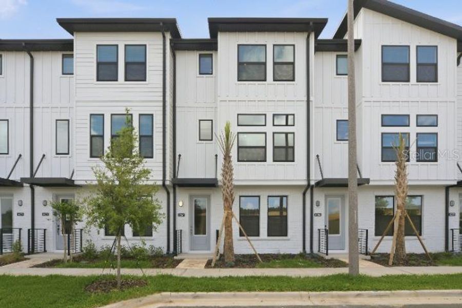 Front exterior of a new home in , Winter Garden, FL, highlighting curb appeal (Image 18).