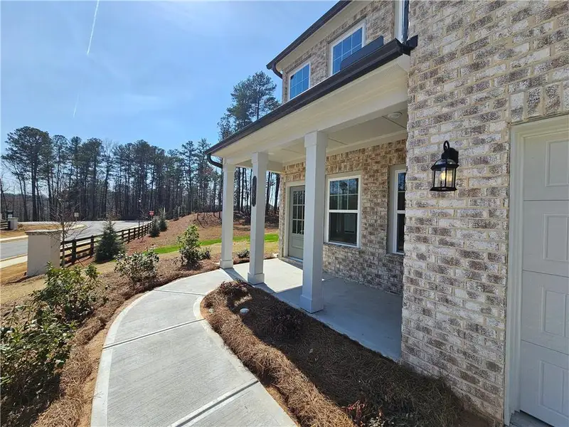 Exterior details and patio area of a home in The Estates at Casteel, Bethlehem (Image 23).