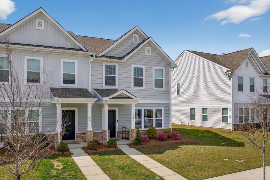 Front exterior of a new home in , Summerville, SC, highlighting curb appeal (Image 1). Front exterior of a new home in , Summerville, SC, highlighting curb appeal (Image 1).